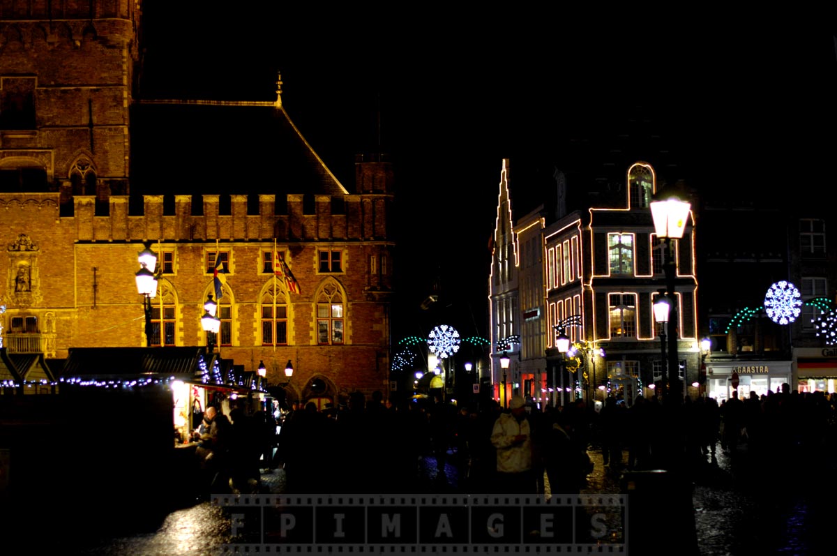 Medieval building and street vendors in Market square